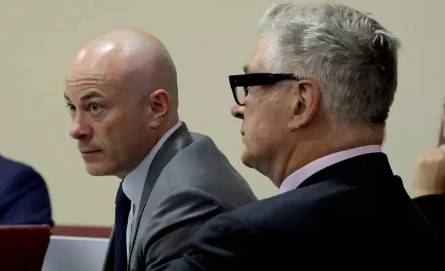 Attorney Luke Nikas, left, and actor Alec Baldwin listen during his hearing in Santa Fe County District Court, Wednesday, July 10, 2024, in Santa Fe, N.M. Baldwin is facing a single charge of involuntary manslaughter in the death of a cinematographer. (AP Photo/Ross D. Franklin, Pool)