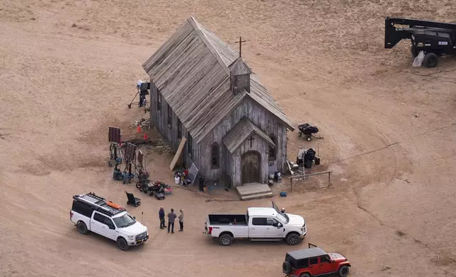 FILE - This aerial photo shows the movie set of "Rust," at Bonanza Creek Ranch, Oct. 23, 2021, in Santa Fe, N.M. A New Mexico judge is considering an array of restrictions on evidence, testimony and arguments ahead of a trial for Alec Baldwin. The Monday, July 8, 2024, pretrial hearing sets the stage for Baldwin to appear in court this week on a single charge of involuntary manslaughter in the death of a cinematographer. (AP Photo/Jae C. Hong, File)