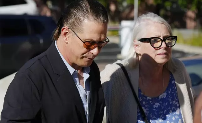 Actor Stephen Baldwin, left, and his sister Elizabeth Keuchler arrive at the courthouse for the second day of their brother Alec Baldwin's trial Thursday, July 11, 2024, in Santa Fe, NM. Baldwin is facing a single charge of involuntary manslaughter in the death of a cinematographer. (AP Photo/Ross D. Franklin)
