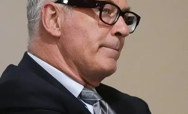 Alec Baldwin listens to testimony during a pretrial hearing in Santa Fe, N.M., on Monday, July 8, 2024. Baldwin is facing a single charge of involuntary manslaughter in the death of a cinematographer. (AP Photo/Ross D. Franklin, Pool)