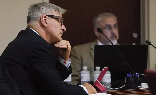 Alec Baldwin listens during a pretrial hearing Monday, July 8, 2024, in Santa Fe, N.M. The actor's involuntary manslaughter trial starts July 9 with jury selection. (AP Photo/Ross D. Franklin, Pool)