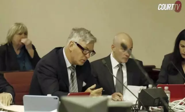 In this image taken from pool video, actor Alec Baldwin, left, appears for a pretrial hearing Monday, July 8, 2024, in Santa Fe, N.M. The actor's involuntary manslaughter trial starts July 9 with jury selection. (Court TV via AP, Pool)