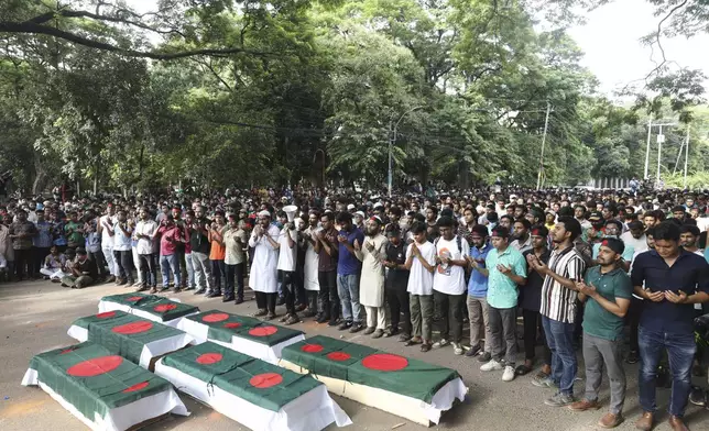 Students advocating for quota reform in public service held a mock funeral at Dhaka University in memory of those who died during clashes, in Dhaka, Bangladesh, Wednesday, July 17, 2024. (AP Photo/Rajib Dhar)