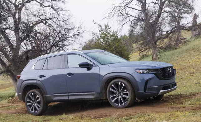 This photo provided by Mazda shows the 2023 CX-50. The CX-50 is fun to drive and stylish inside and out. (Courtesy of Mazda North American Operations via AP)