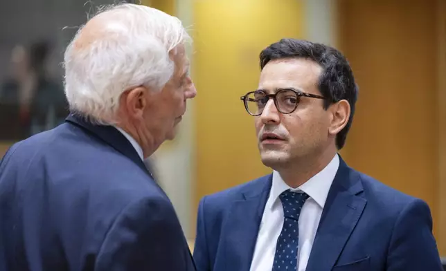 French Foreign Minister Stephane Sejourne, right talks with European Union foreign policy chief Josep Borrell during a meeting of EU foreign ministers at the European Council building in Brussels, Monday, July 22, 2024. European Union foreign ministers on Monday meet to discuss Russian aggression against Ukraine and the situation in the Middle East. (AP Photo/Geert Vanden Wijngaert)