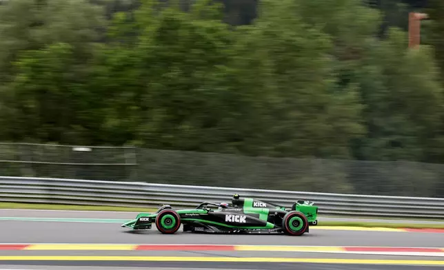 Kick Sauber driver Zhou Guanyu of China steers his car during the first practice session ahead of the Formula One Grand Prix at the Spa-Francorchamps racetrack in Spa, Belgium, Friday, July 26, 2024. The Belgian Formula One Grand Prix will take place on Sunday. (AP Photo/Geert Vanden Wijngaert)