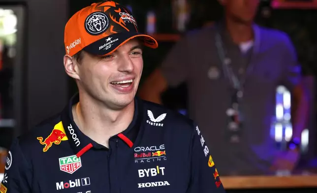 Red Bull driver Max Verstappen of the Netherlands smiles after speaking with fans ahead of the Formula One Grand Prix at the Spa-Francorchamps racetrack in Spa, Belgium, Thursday, July 25, 2024. The Belgian Formula One Grand Prix will take place on Sunday. (AP Photo/Geert Vanden Wijngaert)