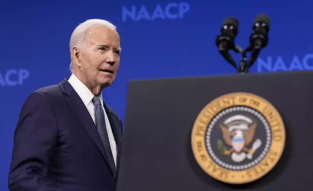 President Joe Biden takes the stage to speak at the 115th NAACP National Convention in Las Vegas, Tuesday, July 16, 2024. Biden tested positive for COVID-19 on Wednesday. (AP Photo/Susan Walsh)