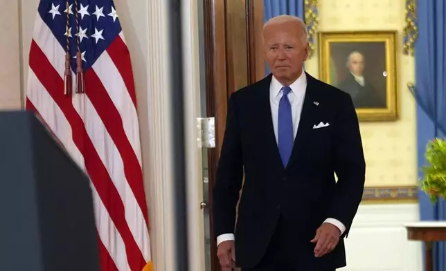 President Joe Biden arrives to speak in the Cross Hall of the White House Monday, July 1, 2024, in Washington. (AP Photo/Jacquelyn Martin)