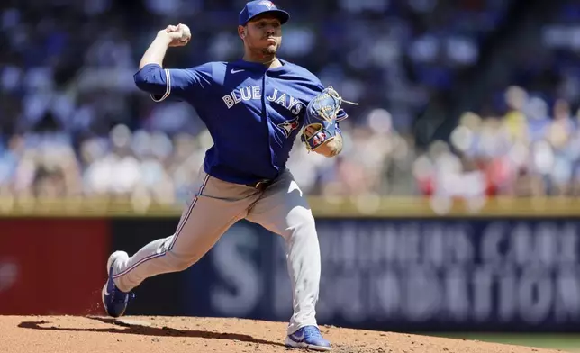 Toronto Blue Jays starting pitcher Yariel Rodríguez throws against the Seattle Mariners during the second inning in a baseball game, Saturday, July 6, 2024, in Seattle. (AP Photo/John Froschauer)