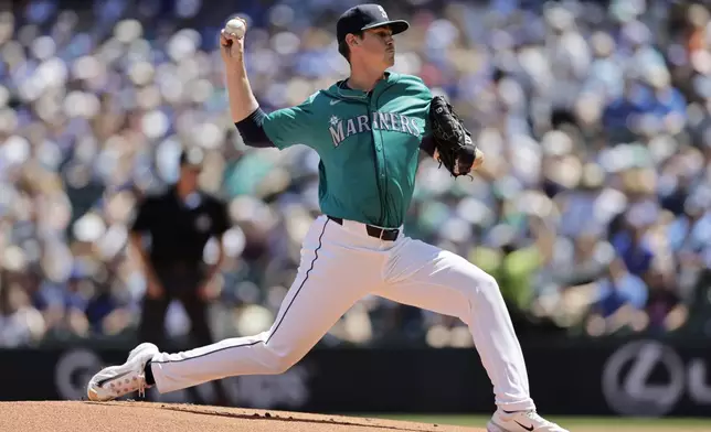 Seattle Mariners starting pitcher Emerson Hancock throws to a Toronto Blue Jays batter during the first inning in a baseball game, Saturday, July 6, 2024, in Seattle. (AP Photo/John Froschauer)