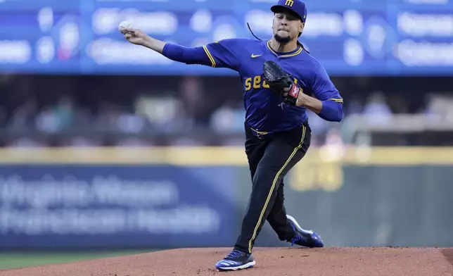 Seattle Mariners starting pitcher Luis Castillo throws against the Toronto Blue Jays batter during the first inning in a baseball game, Friday, July 5, 2024, in Seattle. (AP Photo/John Froschauer)