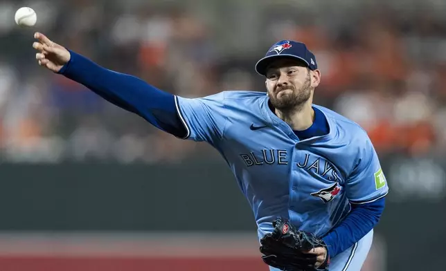 Toronto Blue Jays relief pitcher Zach Pop delivers during the eighth inning of a baseball game against the Baltimore Orioles, Tuesday, July 30, 2024, in Baltimore. (AP Photo/Stephanie Scarbrough)