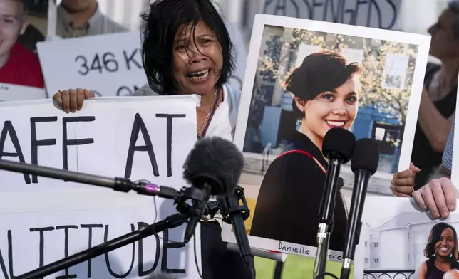 FILE - Clariss Moore, parent of Danielle, one of the crash victims of a Boeing 737 Max 8 in Ethiopia, holds her photograph while speaking at a news conference on Capitol Hill, June 18, 2024, in Washington. On Sunday, July 7, 2024, the Justice Department said Boeing has agreed to plead guilty to a criminal fraud charge stemming from two deadly crashes of 737 Max jetliners. ( AP Photo/Jose Luis Magana, File)