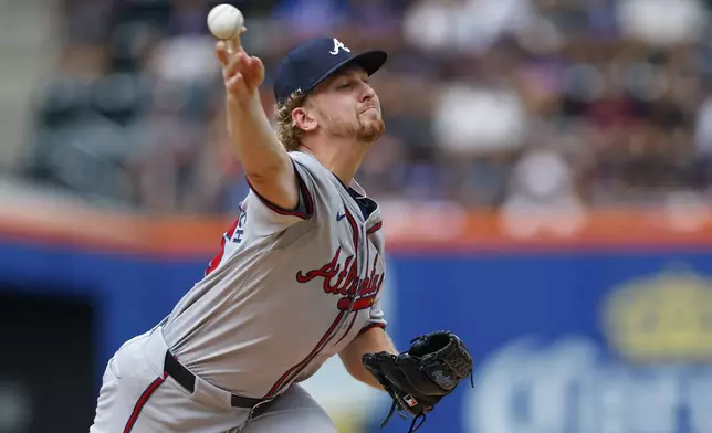 Atlanta Braves pitcher Spencer Schwellenbach (56) delivers a pitch against the New York Mets during the third inning of a baseball game, Saturday, July 27, 2024, in New York. (AP Photo/Rich Schultz)