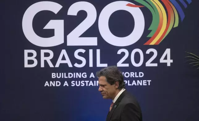 Brazilian Economy Minister Fernando Haddad attends a press conference to review the G20 Finance Ministers and Central Bank Governors Meeting, in Rio de Janeiro, Brazil, Friday, July 26, 2024. (AP Photo/Bruna Prado)