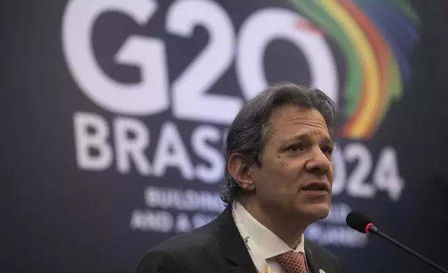 Brazilian Economy Minister Fernando Haddad attends a press conference to review the G20 Finance Ministers and Central Bank Governors Meeting, in Rio de Janeiro, Brazil, Friday, July 26, 2024. (AP Photo/Bruna Prado)