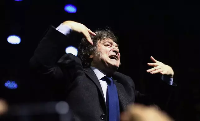 Argentina's President Javier Milei gestures to the audience after giving a speech at CPAC Brasil 2024, a conservative event, in Balneario Camboriu, Santa Catarina state, Brazil, Sunday, July 7, 2024. (AP Photo/Heuler Andrey)