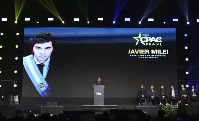 Argentina's President Javier Milei gives a speech at CPAC Brasil 2024, a conservative event, in Balneario Camboriu, Santa Catarina state, Brazil, Sunday, July 7, 2024. (AP Photo/Heuler Andrey)