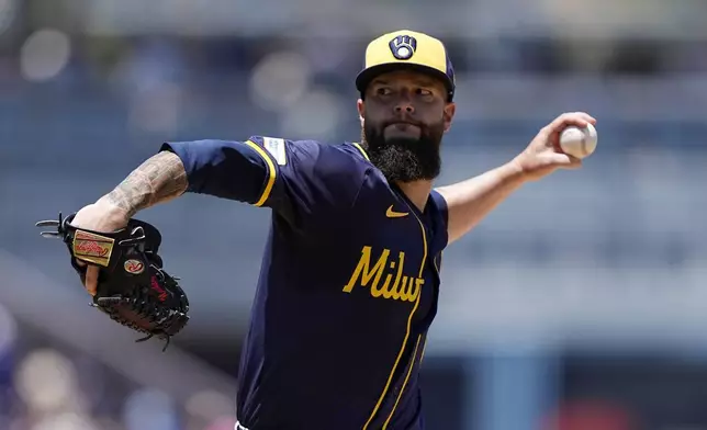 Milwaukee Brewers starting pitcher Dallas Keuchel throws to the plate during the second inning of a baseball game against the Los Angeles Dodgers Sunday, July 7, 2024, in Los Angeles. (AP Photo/Mark J. Terrill)