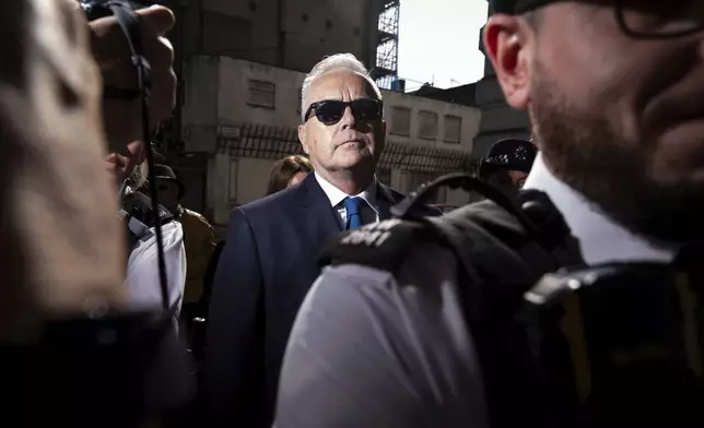 Former BBC broadcaster Huw Edwards arrives at Westminster Magistrates' Court in London, Wednesday, July 31, 2024 where he is charged with three counts of making indecent images of children following a Metropolitan Police investigation. (Aaron Chown/PA via AP)