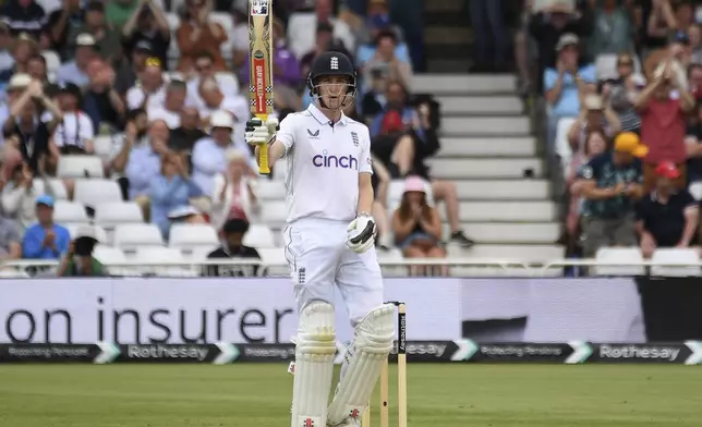 England's Harry Brook celebrates half century during day three of the second Test between England and West Indies at Trent Bridge cricket ground, Nottingham, England, Saturday, July 20, 2024. (AP Photo/Rui Vieira)