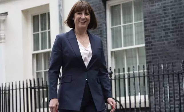 Incoming Chancellor of the Exchequer Rachel Reeves leaves Downing Street in London, Friday, July 5, 2024. Britain's Labour Party swept to power Friday after more than a decade in opposition, as a jaded electorate handed the party a landslide victory, but also a mammoth task of reinvigorating a stagnant economy and dispirited nation. (AP Photo/Thomas Krych)