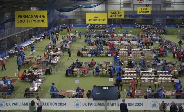 Meadowbank Sports Arena, Magherafelt, Northern Ireland, during the count for the 2024 General Election, Thursday, July 4, 2024. Britain’s Labour Party was headed for a huge majority in Britain’s election on Thursday, an exit poll suggested. (Niall Carson/PA via AP)