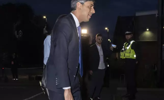 Britain's Prime Minister Rishi Sunak arrives at Northallerton Leisure Centre in Northallerton, North Yorkshire, for the count for the Richmond and Northallerton constituency in the 2024 General Election, Friday July 5, 2024. (Danny Lawson/PA via AP)