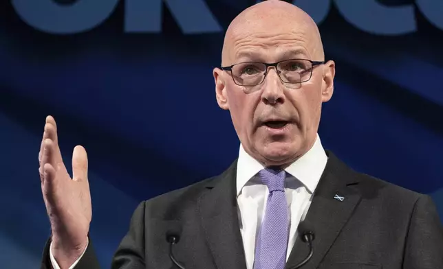 FILE - Scottish First Minister and Scottish National Party leader John Swinney speaks during the party's General Election manifesto launch at Patina in Edinburgh, Scotland, on June 19, 2024. (Jane Barlow/PA via AP, File)