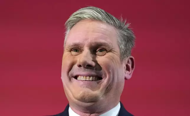 FILE - Keir Starmer, leader of Britain's opposition Labour Party, smiles during a business conference in London, on Feb. 1, 2024. (AP Photo/Kirsty Wigglesworth, File)