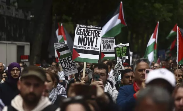 People take part in a pro-Palestinian march in central London, Saturday July 6, 2024. (Tejas Sandhu/PA via AP)