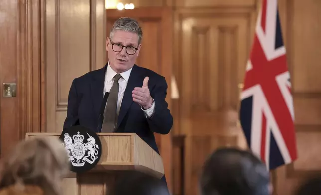 British Prime Minister Keir Starmer delivers a speech, following his first cabinet meeting as Prime Minister, in London, Saturday, July 6, 2024. Britain’s new Prime Minister Keir Starmer has appointed a Cabinet of Labour Party lawmakers and a few outside experts as he tries to tackle priorities including boosting a sluggish economy, building more homes and fixing the creaking state-funded health service.(Claudia Greco, Pool Photo via AP)