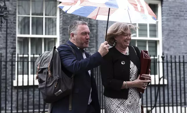 Britain's Environment Secretary Steve Reed and Leader of the House of Lords Baroness Smith leave 10 Downing Street, London, Saturday July 6, 2024, after taking part in Prime Minister Keir Starmer's first Cabinet meeting following the General Election victory for the Labour Party. (Tejas Sandhu/PA via AP)