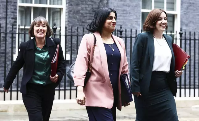 Britain's Welsh Secretary Jo Stevens, left, Justice Secretary Shabana Mahmood, center, and Education Secretary Bridget Phillipson leave 10 Downing Street, London, Saturday July 6, 2024, after taking part in Prime Minister Keir Starmer's first Cabinet meeting following the General Election victory for the Labour Party. (Tejas Sandhu/PA via AP)