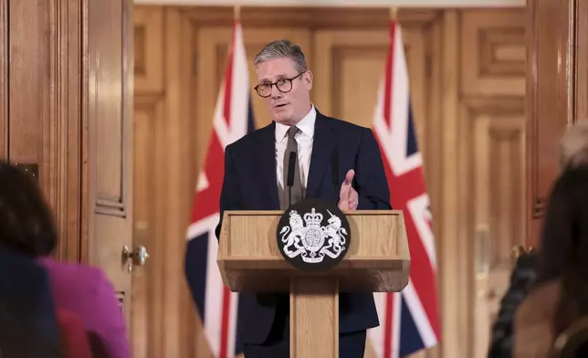 British Prime Minister Keir Starmer delivers a speech following his first cabinet meeting as Prime Minister, in London, Saturday July 6, 2024. (Claudia Greco/Pool via AP)