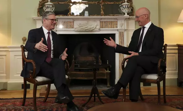 Britain's Prime Minister Keir Starmer, left, meets Scottish First Minister and SNP leader John Swinney during a visit to Edinburgh, Scotland on July 7, 2024 as part of a two-day tour of the four nations of the United Kingdom. (Scott Heppell, Pool Photo via AP)