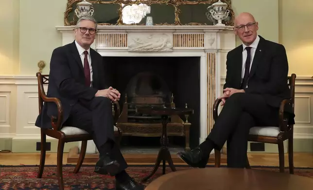 Britain's Prime Minister Keir Starmer, left, meets Scottish First Minister and SNP leader John Swinney during a visit to Edinburgh, Scotland on July 7, 2024 as part of a two-day tour of the four nations of the United Kingdom. (Scott Heppell, Pool Photo via AP)