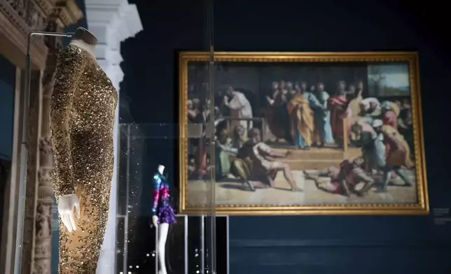 Stage costumes from previous concert tours are displayed at the 'Taylor Swift Songbook Trail Exhibition' in the Raphael Gallery at the Victoria &amp; Albert Museum, on Wednesday, July 24, 2024 in London. (Photo by Scott A Garfitt/Invision/AP)