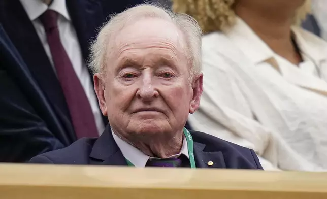 Rod Laver watches the fourth round match between Carlos Alcaraz of Spain and Ugo Humbert of France on Centre Court at the Wimbledon tennis championships in London, Sunday, July 7, 2024. (AP Photo/Alberto Pezzali)