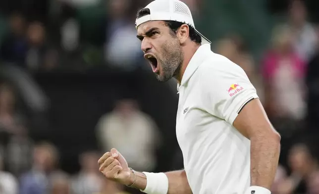 Matteo Berrettini of Italy reacts during his second round match against compatriot Jannik Sinner on day three at the Wimbledon tennis championships in London, Wednesday, July 3, 2024. (AP Photo/Alberto Pezzali)