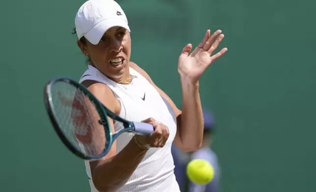 Madison Keys of the United States plays a forehand return to Yafan Wang of China during their second round match at the Wimbledon tennis championships in London, Thursday, July 4, 2024. (AP Photo/Alberto Pezzali)