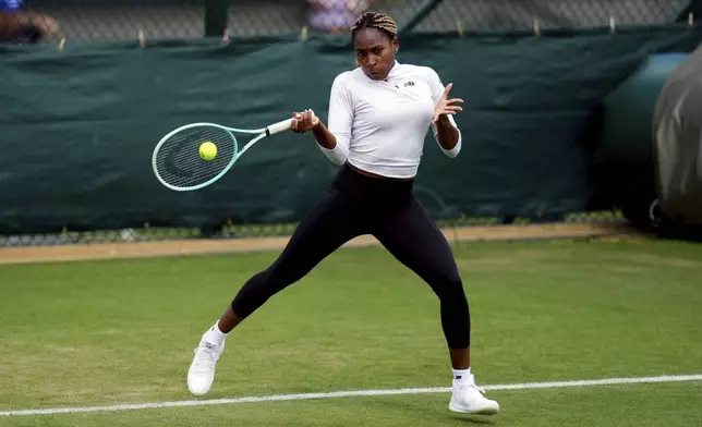 Coco Gauff of the US during a training session at the All England Lawn Tennis and Croquet Club ahead of the Wimbledon tennis championships in London, Sunday, June 30, 2024. (John Walton/PA via AP)