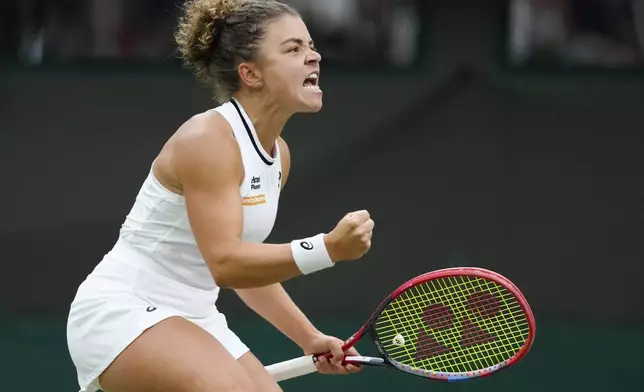 Jasmine Paolini of Italy reacts during her fourth round match against Madison Keys of the United States at the Wimbledon tennis championships in London, Sunday, July 7, 2024. (AP Photo/Kirsty Wigglesworth)