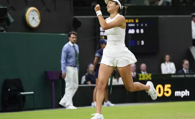 Emma Raducanu of Britain reacts after defeating Maria Sakkari of Greece in their third round match at the Wimbledon tennis championships in London, Friday, July 5, 2024. (AP Photo/Alberto Pezzali)