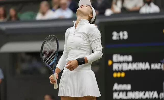 Anna Kalinskaya of Russia reacts during her fourth round match against Elena Rybakina of Kazakhstan at the Wimbledon tennis championships in London, Monday, July 8, 2024. (AP Photo/Kirsty Wigglesworth)