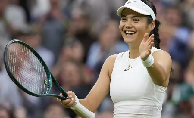 Emma Raducanu of Britain reacts after defeating Maria Sakkari of Greece in their third round match at the Wimbledon tennis championships in London, Friday, July 5, 2024. (AP Photo/Alberto Pezzali)