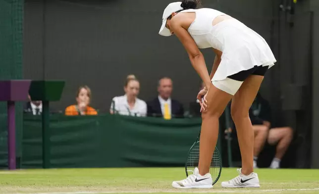 Madison Keys of the United States reacts during her fourth round match against Jasmine Paolini of Italy at the Wimbledon tennis championships in London, Sunday, July 7, 2024. (AP Photo/Kirsty Wigglesworth)