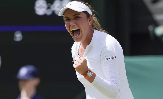 Donna Vekic of Croatia reacts after winning a point against Jasmine Paolini of Italy during their semifinal match at the Wimbledon tennis championships in London, Thursday, July 11, 2024. (AP Photo/Alberto Pezzali)