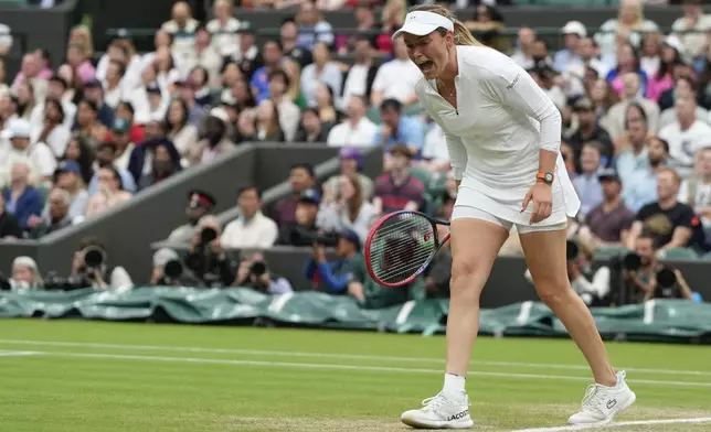 Donna Vekic of Croatia reacts during her quarterfinal match against Lulu Sun of New Zealand at the Wimbledon tennis championships in London, Tuesday, July 9, 2024. (AP Photo/Kirsty Wigglesworth)